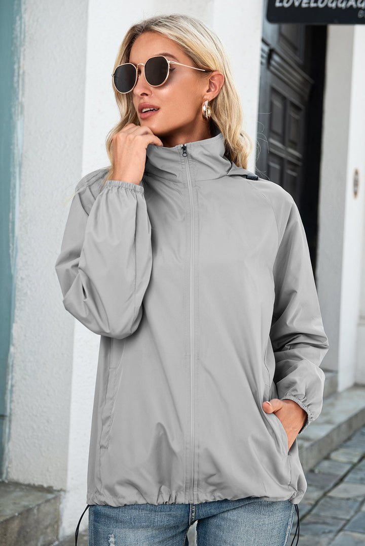 Bushra | Women's Hooded Rain Jacket | Drawstring Hem Zip Up